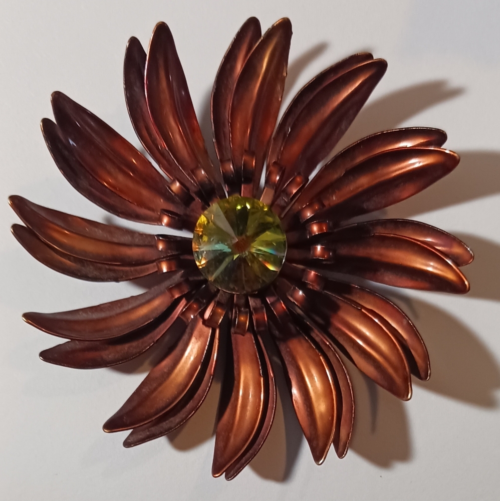 Elegant Copper Flower Brooch with Green Gem